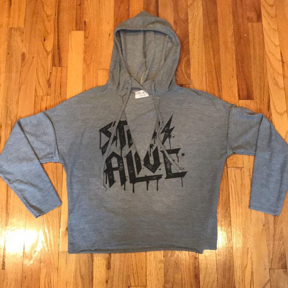 Grey graphic  hoodie with a flair!